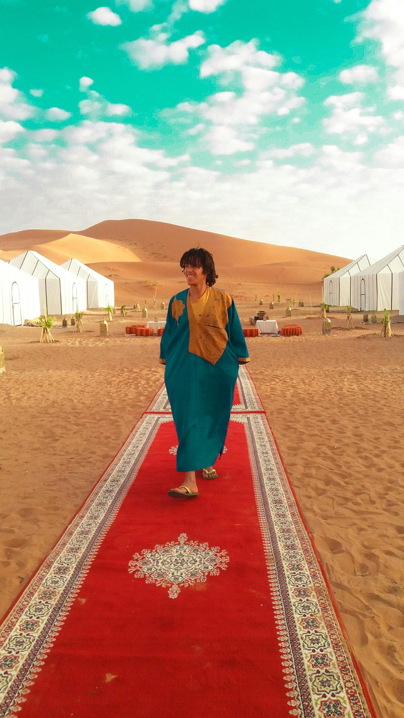 A luxury camp scene with carpets and Berber touches in the Merzouga desert